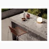 Gresie Ceppo di Gre Grey Mat 60x120 cm – ambient terasa, masa de piatra pe terasa cu scaun ratan, pe pardoseala