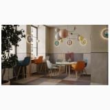 Gresie Concrete Dust 60x120X1.2 cm – ambient comercial, zona lounge cu scaune colorate si gresie multicolora, pe pardoseala