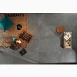 Gresie Stone Plan Lavagna Grigia 60x120 – ambient living, vedere de sus, pardoseala gri, covor, taburete, cutii decorative