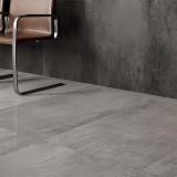 Gresie ABK Interno 9 Silver Mat 30x60 cm – ambient comercial, scaun piele maro pe gresie gri mata, perete similar, pe pardoseala