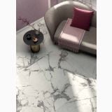 Gresie Abk Invisible Pearl Lucios 120x120 cm – ambient living, living cu canapea gri, pernă roz, gresie marmorata, pe pardoseala
