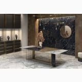 Gresie Abk Lilac Grey Mat 120x120 cm – ambient comercial, showroom cu masa marmorata, perete negru si oglinda rotunda, pe pardoseala