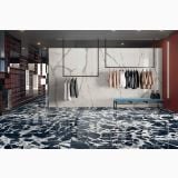 Gresie Abk Statuario Versilia Mat 60x120 cm – ambient comercial, showroom haine cu pardoseala marmura albastra lucioasa