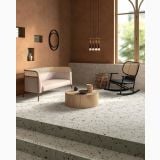 Gresie Progetto PO 06 Cipria 20x20 cm – ambient living, living cu canapea, scaun balansoar si masa lemn, pe pardoseala