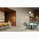 Gresie Gigacer Concept 1 Milk Texture Mat 60x60 cm – ambient comercial, restaurant elegant cu bar, mese rotunde si scaune colorate, pe pardoseala