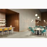 Lastra Gresie Gigacer Concept 1 Milk Texture Mat 60x250 cm – ambient comercial, restaurant modern cu bar, mese turcoaz si pardoseala gri