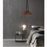 Gresie Concrete Grey Mat 60x120x1.2 cm – ambient dormitor, dormitor gri cu pat, veioza si cuier suspendat, pe pardoseala si perete