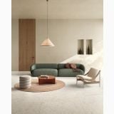 Gresie Portelanata Delconca HAU 10 White 60x60cm – ambient living, living modern cu canapea verde si covor rotund, pe pardoseala