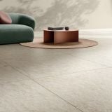 Gresie Portelanata Delconca HAU 10 White Mat 80x80 cm – ambient living, living cu canapea verde si masuta terracota pe gresie, pe pardoseala
