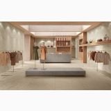Gresie Portelanata Delconca HAU 10 White Mat 80x80 cm – ambient comercial, showroom haine cu pardoseala si pereti gresie deschisa, pe pardoseala si perete