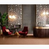 Gresie Newdeco Fire Mat 60x60 cm – ambient comercial, receptie moderna cu fotolii rosii si perete terrazzo, pe pardoseala