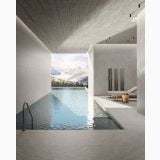 Gresie Exterior Nesting HNS 205 Grey 80x80x2 cm – ambient piscina, piscina interioara cu vedere spre munti si sezlonguri, pe pardoseala