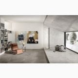 Gresie HBO 10 Invisible Gray Mat 30x60 cm – ambient living, living modern cu biblioteca, fotoliu si perete piatra, pe pardoseala