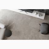 Gresie HBO 5 Bronzo Amani 30x60 Mat – ambient living, living modern cu canapea, masuta neagra si scaun gri, pe pardoseala