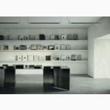 Gresie Portelanata Italgraniti Natural Greige 120x120 – ambient comercial, spatiu comercial cu rafturi carti si masa metalica, pe pardoseala si perete