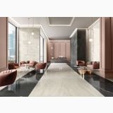 Lastra Gresie Pietra Grey Lucios 120x280x0,6 cm – ambient comercial, lobby elegant cu pardoseala marmorata si canapele roz, pe pardoseala si perete