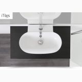 Lavoar Ceramica Oval LAV23 56x40 cm – ambient baie, lavoar oval alb pe blat negru, vedere de sus, pe pardoseala si perete