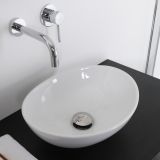 Lavoar Ceramica Oval LAV7 40x33 cm – ambient baie, lavoar oval alb pe blat negru cu baterie perete