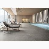 Gresie de exterior Stone Plan Luserna Grigia Antislip Mat 40x120x2 cm – ambient piscina, zona piscina interioara cu pardoseala gresie gri antracit