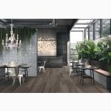 Gresie Imitatie Lemn Poetry Wood Mud 20x120 cm – ambient comercial, restaurant modern cu plante verzi si candelabru alb, pe pardoseala