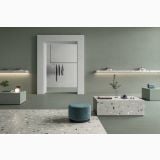 Gresie Nuances Salvia 60x120 cm – ambient comercial, showroom minimalist cu pardoseala terrazzo si pereti verzi