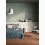 Gresie Progetto PO Origini Terazzo 20x20 cm – ambient dormitor, dormitor cu pat verde, perete terrazzo si pardoseala terracota