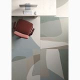 Gresie Decorata HBE Shapes Artico 120x120 cm – ambient living, birou cu scaun rosu pe pardoseala decorata abstract