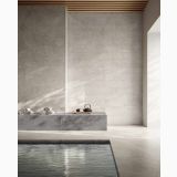 Gresie Bergstone Pearl 30x60 cm – ambient piscina, piscina interioara cu perete gri si banca minimalista