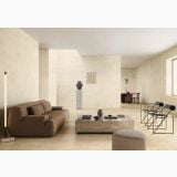 Gresie Portelanata Calcis Crema Mat 120x120 cm – ambient living, living minimalist cu canapea maro si pereti crem, pe pardoseala si perete