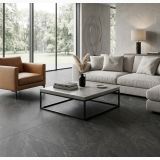 Gresie Portelanata HNS 08 Antracite 120x120 cm – ambient living, living modern cu canapea gri si fotoliu maro, pe pardoseala