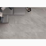 Gresie Portelanata iTiles StoneForm Grigio 60x120 cm – ambient living, vedere de sus canapea gri pe gresie mare, pe pardoseala