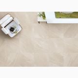 Gresie Portelanata iTiles StoneForm Ivory 60x120 cm – ambient living, pardoseala bej cu masuta alba si fotoliu