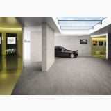 Gresie Waystone Dark 30x60 cm – ambient comercial, showroom auto cu pardoseala gri gresie mata