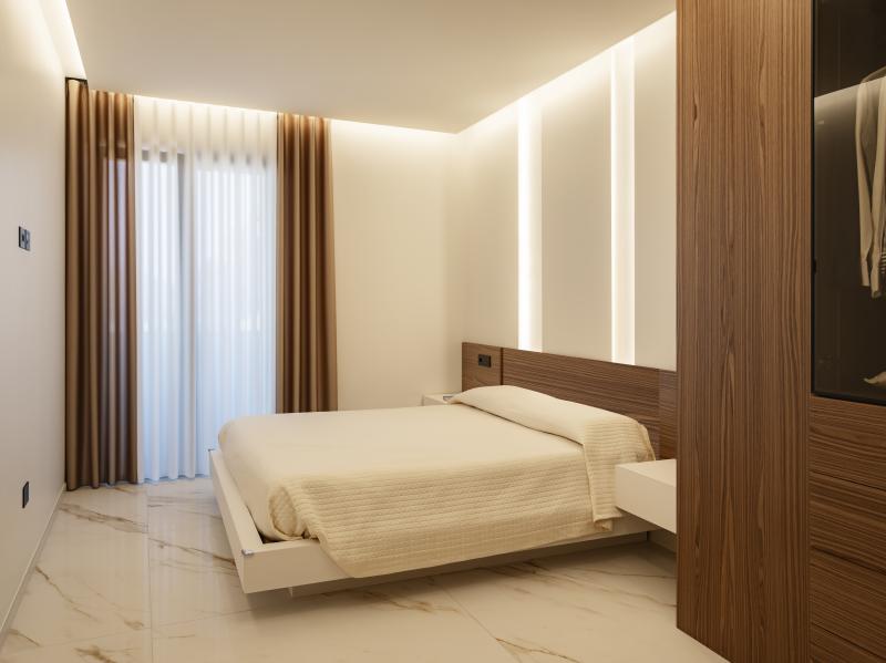 Dormitor minimalist cu accente calde | Inspirație Dormitor Luxe